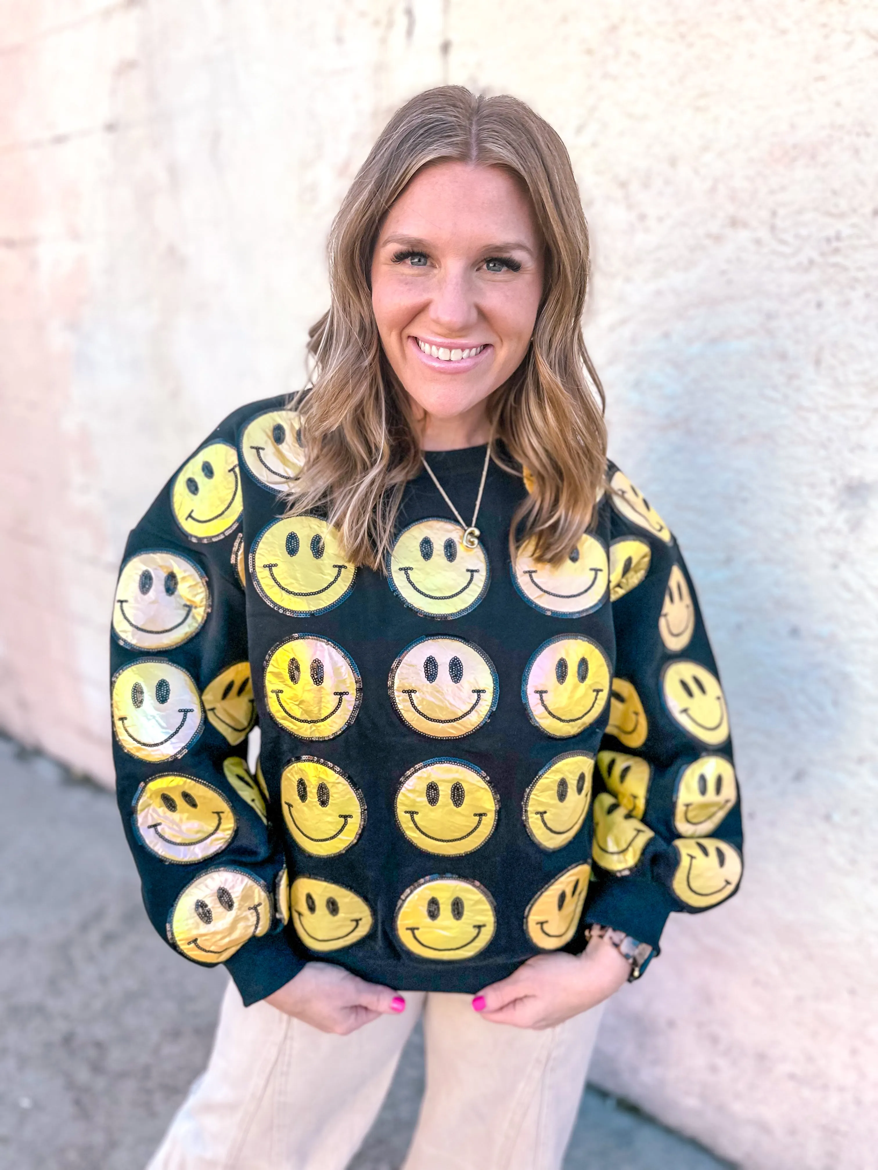 Queen of Sparkles: Black and Yellow Scattered Smiley Face Sweater